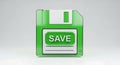 Retro Technology: A Vibrant Green Floppy Disk with 'SAVE' Icon Royalty Free Stock Photo
