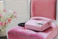 Old pink home phone. Wired vintage phone. Retro Royalty Free Stock Photo