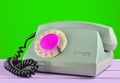 Retro telephone on yellow pastel background. Royalty Free Stock Photo