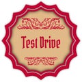 Retro TEST DRIVE magenta badge.