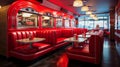 A retro-themed diner with red leather booths and a jukebox