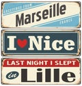 Retro tin sign collection with French cities