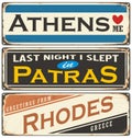 Retro tin sign collection with Greece city names
