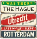 Retro tin sign collection with Netherlands city names