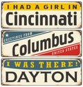 Retro tin sign collection with USA city names