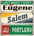 Retro tin sign collection with USA city names