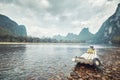 Retro toned picture of a bamboo raft on Li River, China. Royalty Free Stock Photo