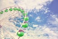 Retro toned picture of a Ferris wheel. Royalty Free Stock Photo