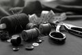 Retro tools for cutting and sewing. Needle with thread, thimble, sewing machine and scissors Royalty Free Stock Photo