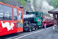 Retro train with locomotive crew before departure.