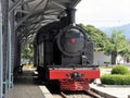 Retro train stands on the railway station.