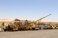 Row of retro trucks and equipment for opal mining, Andamooka, Australia Royalty Free Stock Photo