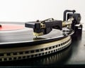 Retro turntable vinyl record player. Vintage record player. Old analog audio equipment for sound enthusiast and Royalty Free Stock Photo