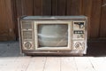 Retro tv with wooden case in room Royalty Free Stock Photo