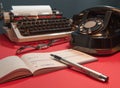 retro typewriter, checkbook, old telephone, ink pen. lettering in french - received from mr. for Royalty Free Stock Photo