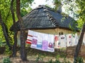 Retro ukrainian cottage. Traditional embroidered shirt and towel