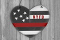 Retro I love thin red line NYFD sign on weathered wood