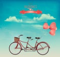 Retro Valentine`s Day holiday background with tandem bicycle with heart shape balloons. Royalty Free Stock Photo