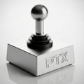 Retro video game controller with a metallic silver and black joystick labeled ptx Royalty Free Stock Photo