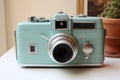 Retro vintage blue camera on table. Generative AI