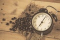 Retro vintage clock with coffee bean Royalty Free Stock Photo