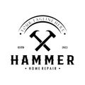 retro vintage crossed hammer and nail logo for home repair services, carpentry, badges, builders, woodworking, construction, Royalty Free Stock Photo