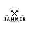 retro vintage crossed hammer and nail logo for home repair services, carpentry, badges, builders, woodworking, construction, Royalty Free Stock Photo