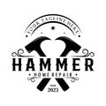 retro vintage crossed hammer and nail logo for home repair services, carpentry, badges, builders, woodworking, construction, Royalty Free Stock Photo