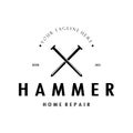 retro vintage crossed hammer and nail logo for home repair services, carpentry, badges, builders, woodworking, construction, Royalty Free Stock Photo