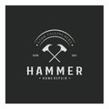 retro vintage crossed hammer and nail logo for home repair services, carpentry, badges, builders, woodworking, construction, Royalty Free Stock Photo