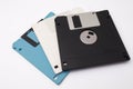 Retro vintage floppy disk diskettes on white, old time computer storage equipment hardware Royalty Free Stock Photo