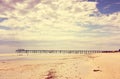 Retro Vintage instant filter wide open beach with beautiful cloud sky