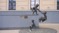 Retro vintage metal bronze Children and dog playing statue decoration art in Kazan Russia