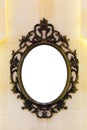 Vintage mirror with metal classic frame on the wall Royalty Free Stock Photo