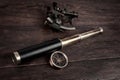 Retro vintage naval spyglass telescope with sextant and compass