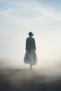 Retro vintage noir woman - 1900s era - walking down a foggy empty rural background landscape