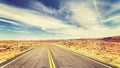 Retro vintage old film style endless country highway. Royalty Free Stock Photo