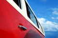 Retro vintage red bus. Car door handle. The car is older than 1985. Royalty Free Stock Photo