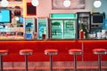 Retro, vintage and stools with interior in a diner, restaurant or cafeteria with funky decor. Trendy, old school and
