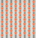 Retro and vintage styled heart and stripe pattern with muted colors green orange yellow and red