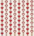 Retro and vintage styled heart and stripe pattern with muted colors red brown and white
