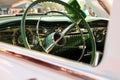 Retro vintage white car. Steering wheel. The car is older than 1985 Royalty Free Stock Photo