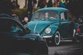 Retro Volkswagen Kafer car at an event with cruising old cars in a small town in Sweden.