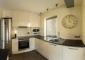 Retro wall clock in kitchen