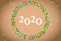 2020 on retro warm brown background with sparkling stars and grunge Royalty Free Stock Photo