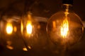 Retro warm light bulbs in glass lamps. Royalty Free Stock Photo