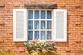 Retro white window on brick