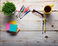 Retro white wooden table with empty colorful sticky notes