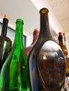 Retro wine bottles of different shapes and colors Royalty Free Stock Photo