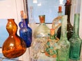 Retro wine bottles in a showcase